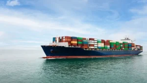 Container ship carrying cargo at sea